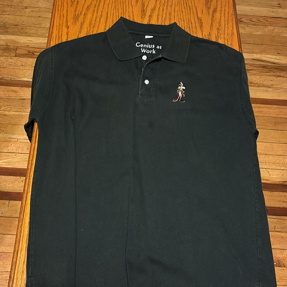 Black Polo type shirt size medium, 2000 Warner Bros. With Wiley Coyote.